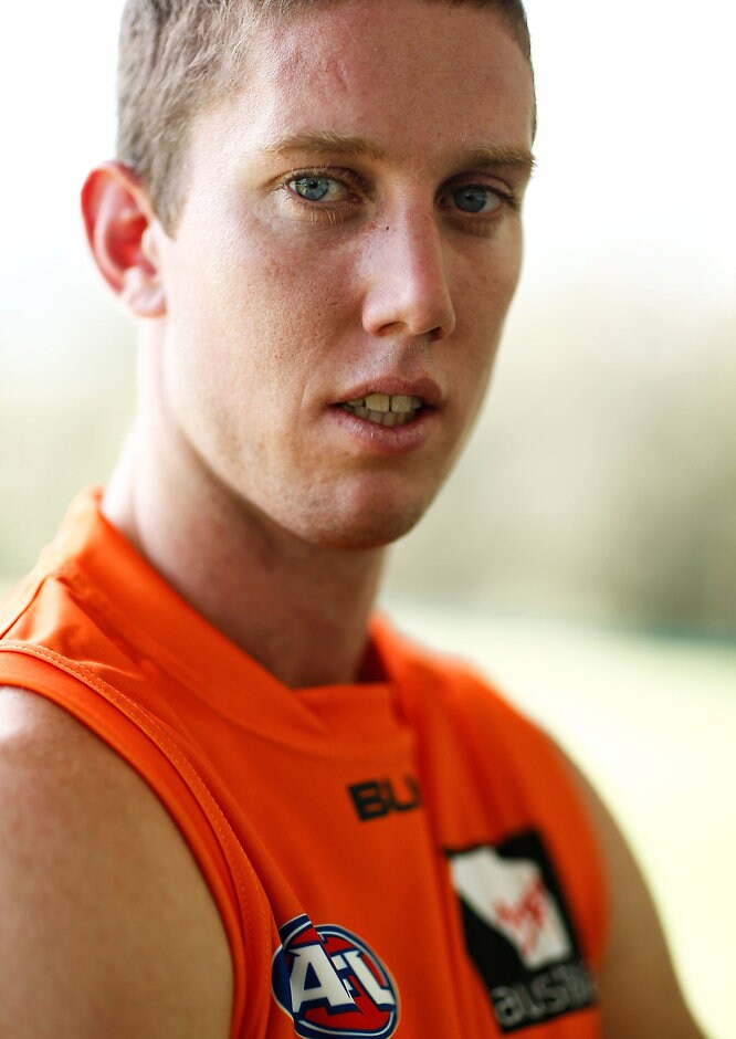 AFL 2015 Portraits - GWS Giants Tim Golds poses for a photograph during the GWS Giants 2015 team photo day at the Learning Life Centre, Sydney on January 14, 2015. (Photo: Michael Willson/AFL Media) (Editor's Note: A digital filter has been applied to this image)